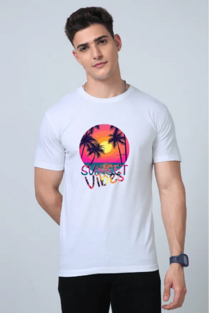 Man wearing a white t-shirt with 'Sunset Vibes' design on a plain background